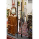 A brass studded leather upholstered mahogany folding pole/library ladder.