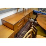 A teak long sideboard.