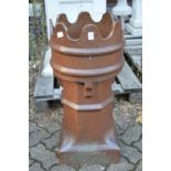 A large salt glazed chimney pot.