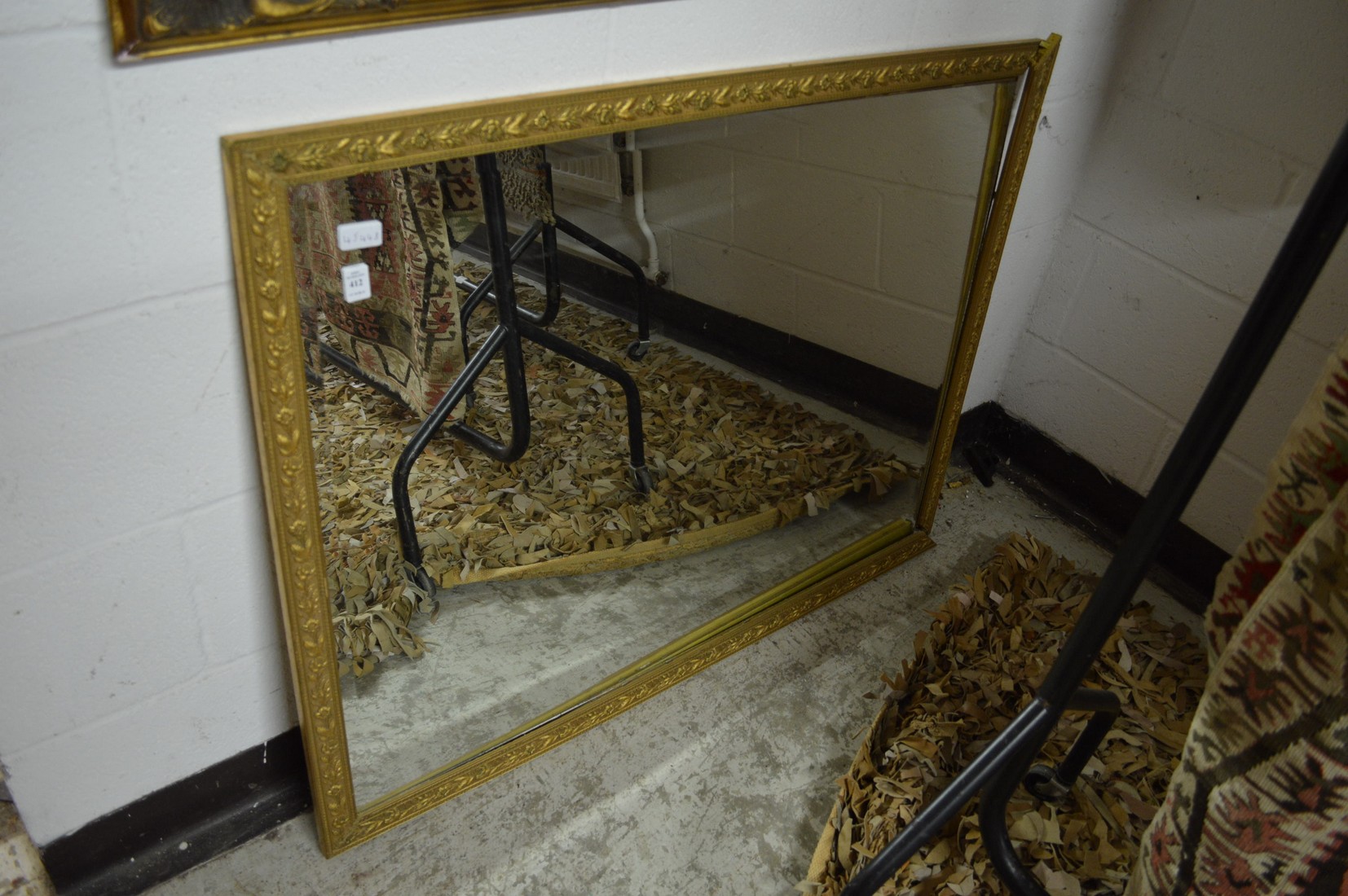 A gilt framed mirror (frame af).