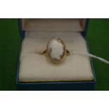 A 10ct gold ring mounted with a cameo size Q.