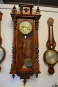 A good large walnut cased Vienna wall clock.