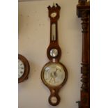 A rosewood cased aneroid barometer and thermometer.