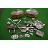 A collection of silverware to include decanter labels, pedestal bowl, brushes etc.