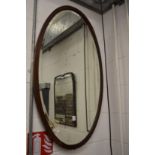 Two mahogany framed mirrors.