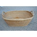 A large wicker twin handled basket.