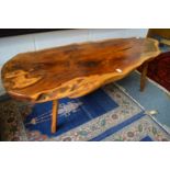 A solid yew wood plank top coffee table.