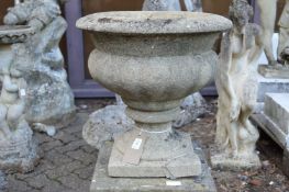 A pair of composite circular pedestal garden planters (repairs).