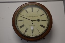 A 19th century mahogany cased circular wall clock with fusee movement and later painted 14 inch