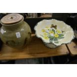 A studio pottery lamp base and a floral decorated pottery pedestal bowl.