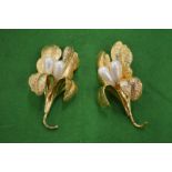 A pair of decorative brooches, signed Uter Que.