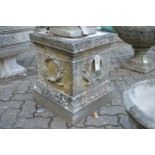 A classical style composite square shaped pedestal stand.