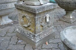A classical style composite square shaped pedestal stand.