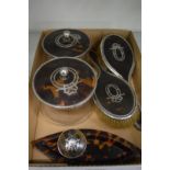 Silver and tortoiseshell mounted dressing table items to include two glass jars with covers and