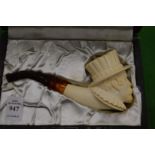 A large figural Meerschaum pipe, boxed.