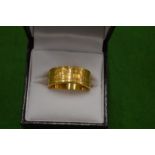 A 1954 gold plated coin ring size V.