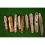 A group of silver bladed fruit knives, 9ct gold mounted pen knife etc.