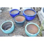 Five various torquoise and blue glazed garden planters.