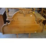 A Victorian style pine 5ft headboard.