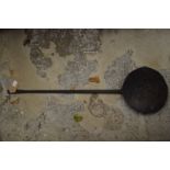 An old wrought iron ladle.