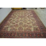 A large Persian style carpet 420cm x 295cm