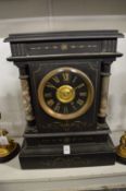 A large Victorian slate mantle clock.