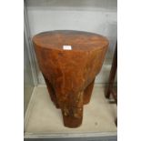 Kare design, a rustic wood stool.