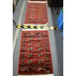 Two small Bokara rugs 100cm x 66cm and 105cm x 65cm.