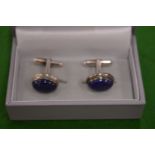 A pair of silver and lapis cufflinks, boxed.