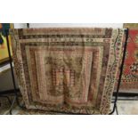 A good large flat weave kilim carpet with all-over stylised decoration (some ware and holes) 385cm x