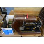 A Singer sewing machine etc.