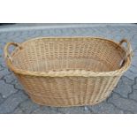 A large wicker twin handled basket.