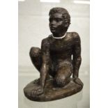 Karin Jonzen, bronze resin sculpture on a kneeling boy.