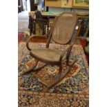 A Thonet child's Bentwood rocking chair.