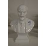 A small white porcelain bust of Lenin.