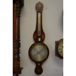 An inlaid mahogany cased aneroid barometer and thermometer, the silvered dial signed F Molton,