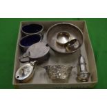 A collection of small silverware to include a circular bowl and oval mustard, small pierced basket