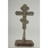 A FINE 18TH CENTURY OTTOMAN ARMINIAN OR BALKANS ENAMELLED CROSS on a later wooden stand, cross