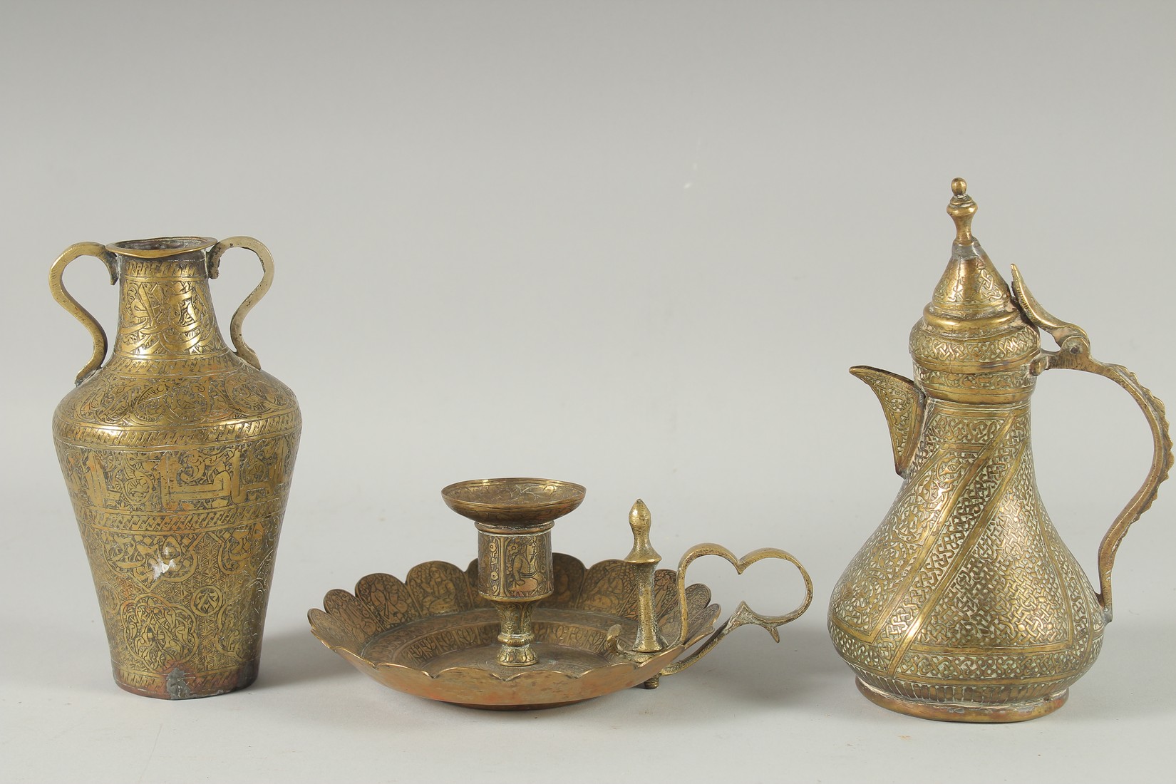 THREE 19TH CENTURY IRANIAN ENGRAVED BRASS PIECES; comprising a twin handle vase / vessel with - Image 5 of 8