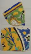 TWO 17TH CENTURY PERSIAN SAFAVID CUERDA SECA TILE FRAGMENTS, 15cm x 13cm and 12.5cm x 13cm.