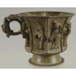 A CHINESE BRONZE CUP WITH RELIEF CAST FIGURES, mark to base possibly Da Tang Zhen Guan (true