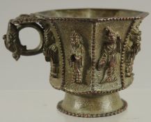 A CHINESE BRONZE CUP WITH RELIEF CAST FIGURES, mark to base possibly Da Tang Zhen Guan (true
