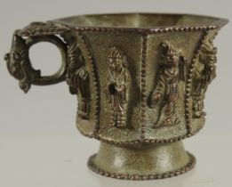 A CHINESE BRONZE CUP WITH RELIEF CAST FIGURES, mark to base possibly Da Tang Zhen Guan (true