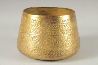 A LATE 19TH CENTURY TOMBAK GILT COPPER BOWL, with engraved decoration and calligraphy