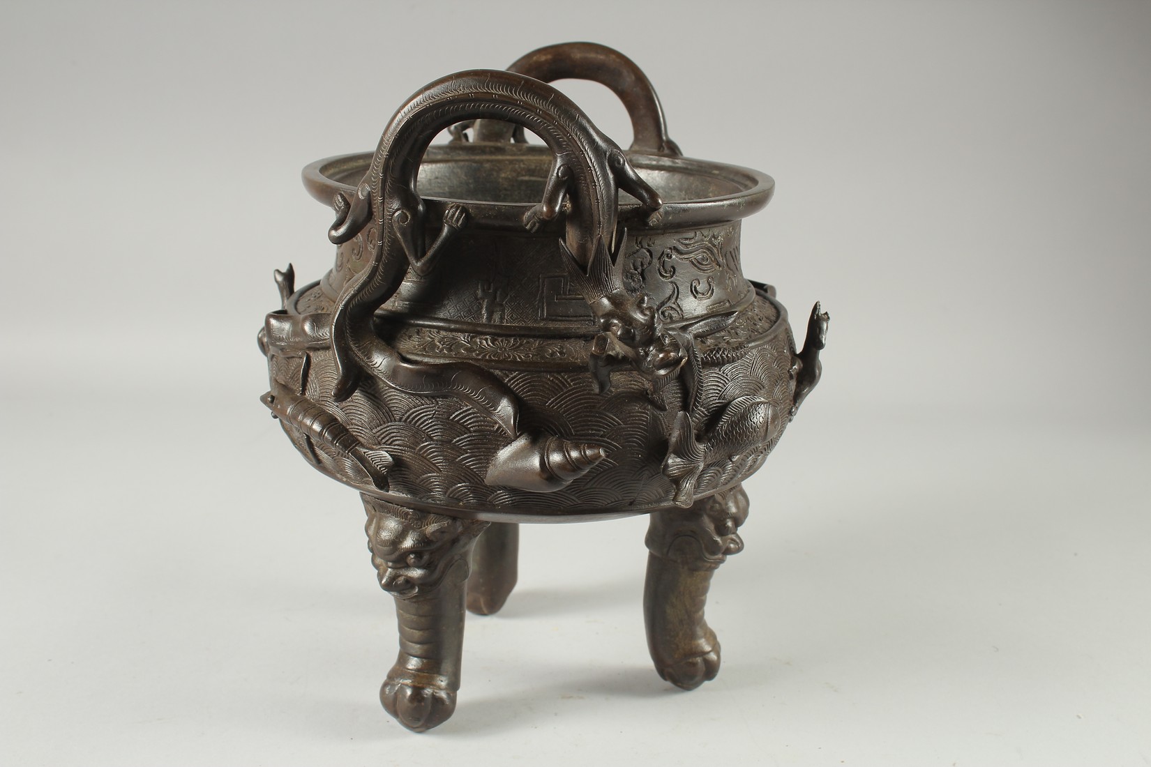 A LARGE CHINESE BRONZE TWIN HANDLE TRIPOD CENSER, with relief horses and sea creatures, the - Image 2 of 7