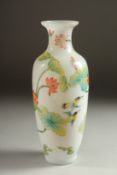 A CHINESE PAINTED GLASS VASE, decorated with birds, butterflies, and flora, 23cm high.