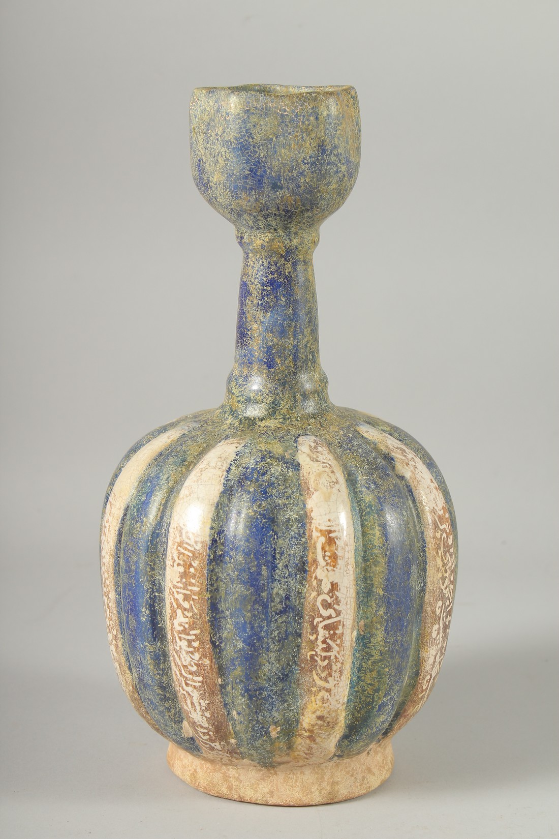 A KASHAN STYLE GLAZED POTTERY VASE, the body of ribbed form with panels of - Image 4 of 6