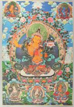 A TIBETAN THANGKA MOUNTED ON PAPER.