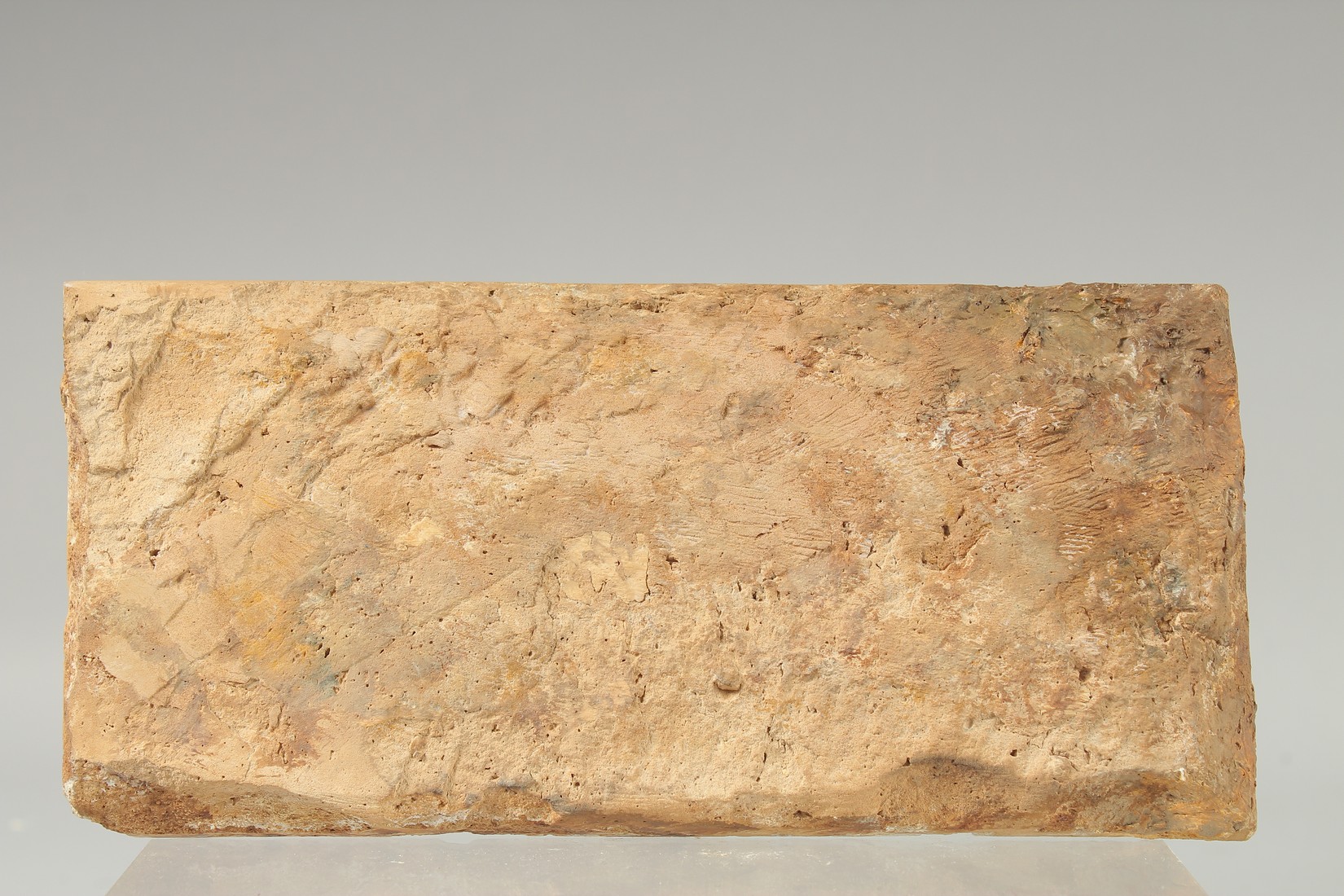 A FINE 17TH CENTURY PERSIAN SAFAVID GLAZED POTTERY TILE, 23cm x 11cm. - Image 2 of 2