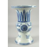 A LARGE CHINESE BLUE AND WHITE PORCELAIN GU SHAPE VASE, decorated with floral motifs, (repair to